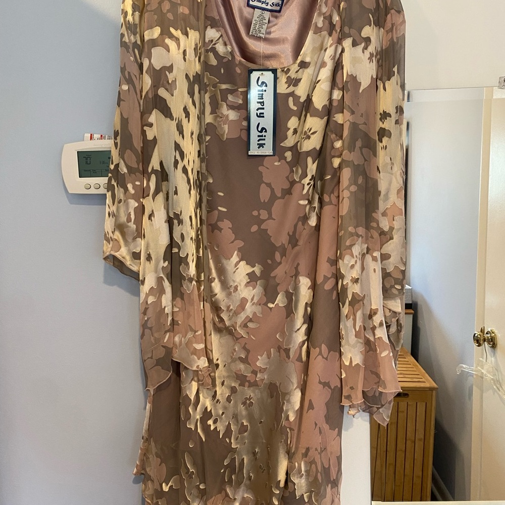 Dress. Mother or grandmother of the bride. Never worn